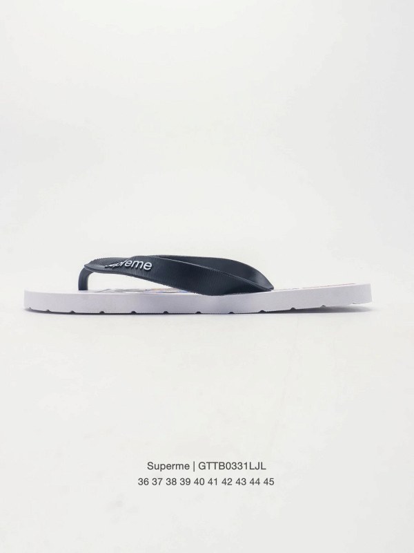 Supreme black rubber slide with a wide, unisex size span