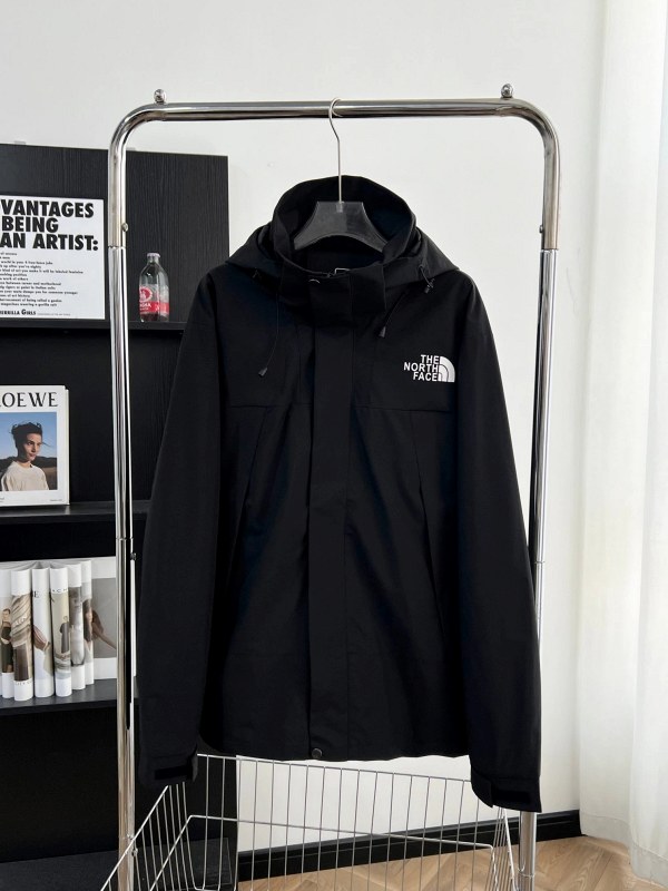 The North Face black shell jacket with listed DryVent construction and YKK zippers