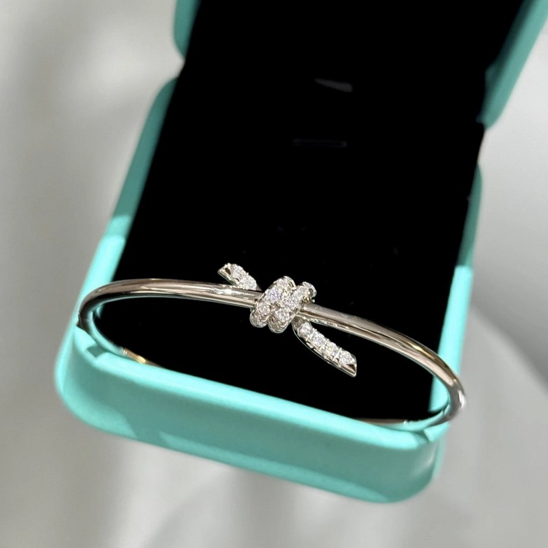 Tiffany & Co. Black Everyday Ring With a Wrapped-Knot, Half-Diamond Motif