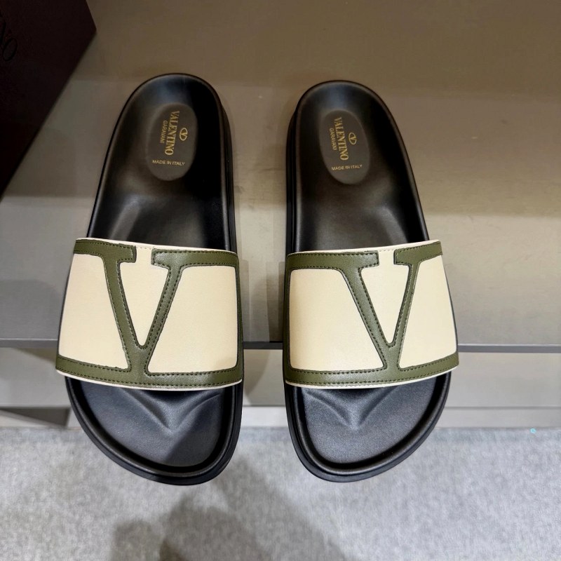 Valentino black metal-logo flat slides in EU sizing