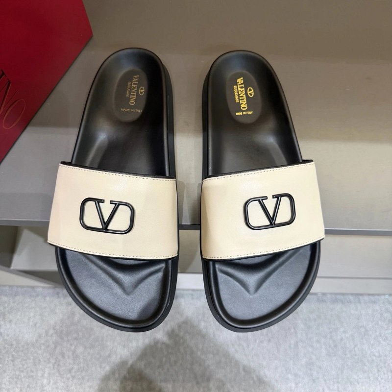 Valentino Metal-Logo Leather Slides: Flat Casual Style on a Rubber Outsole, Listed in EU 39–45