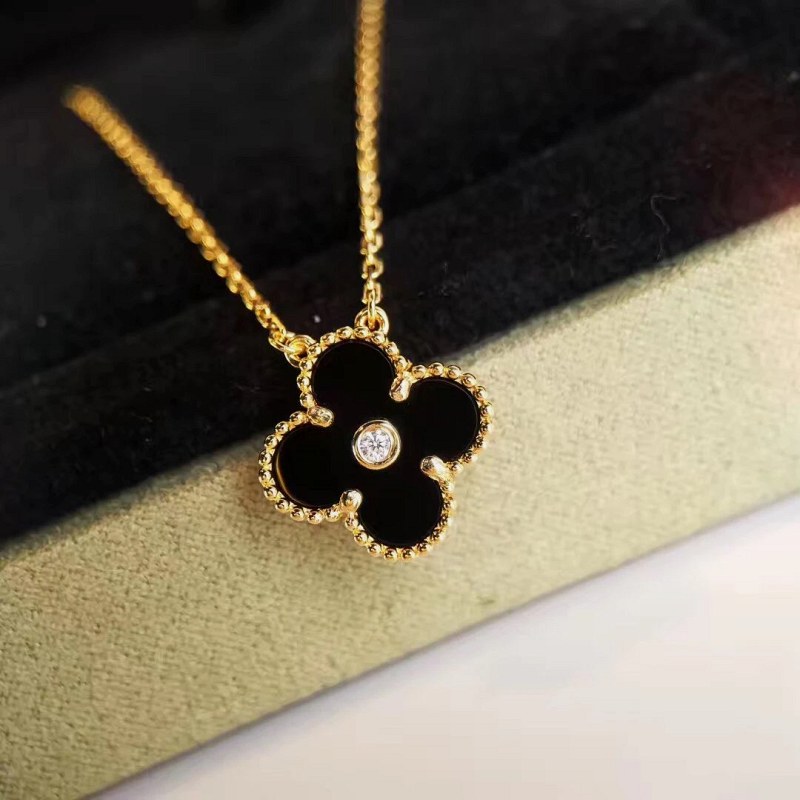 Van Cleef & Arpels floral gold jewelry in modern everyday style