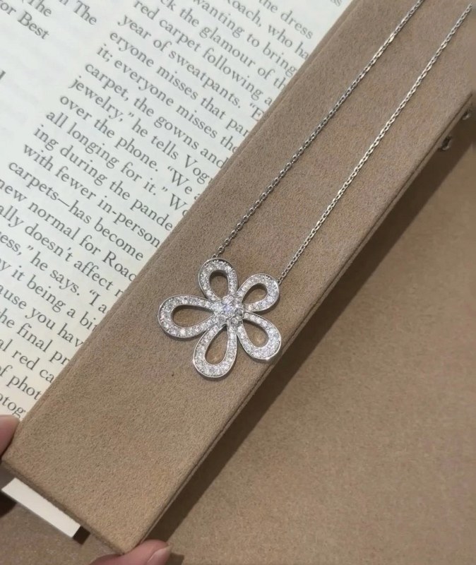 A Silver-Tone Openwork Take on the Van Cleef & Arpels Flowerlace Pendant
