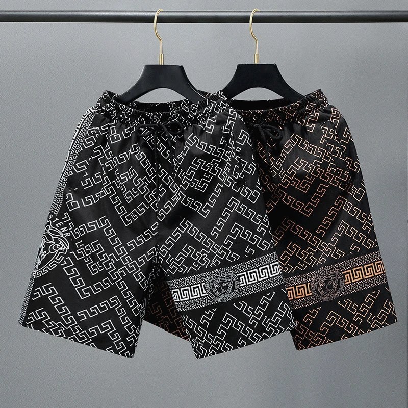 Versace black shorts in a straight, no-stretch polyester cut, sizes M through 5XL